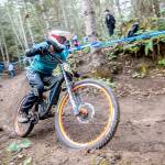(Jesse Major/Peninsula Daily News) Annie Craig of Orting races at the Northwest Cup at Dry Hill west of Port Angeles on Sunday. Craig finished third in the womens 19-plus Cat 1 race.