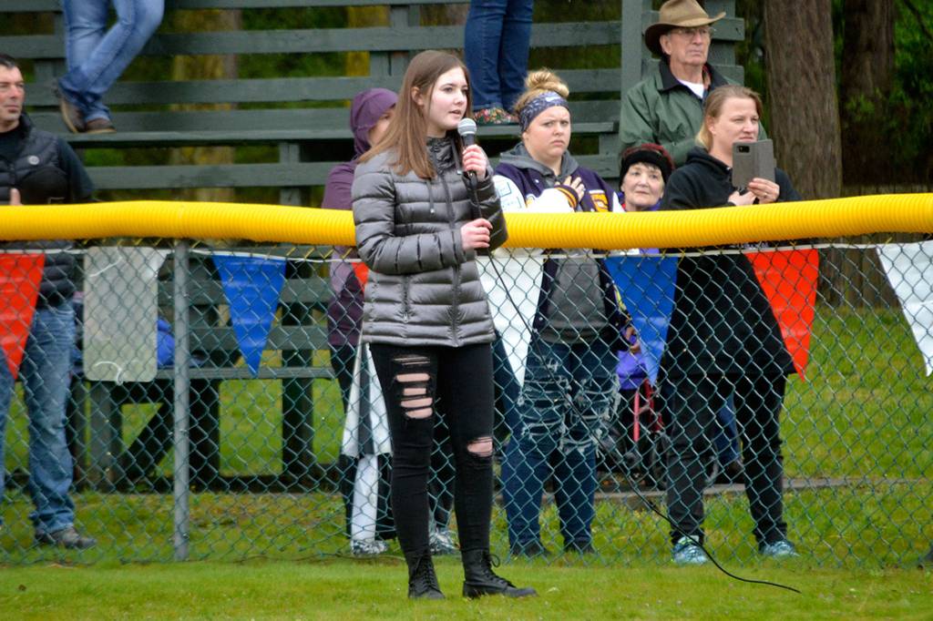Ava Bower sings The Star-Spangled Banner for opening day of the Sequim Little League season on April 13.