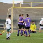 Sequims Adrian Funston, center, celebrates with teammates Mathys Tanche, center left, and Eli Gish after Funstons first half score. His goal proved to be the game-winner in a 1-0 Sequim victory over Port Angeles on April 9. Sequim Gazette photo by Michael Dashiell