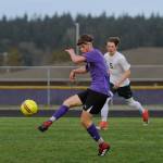 Sequims Adrian Funston looks for an open teammate as Port Angeles Hollund Bailey looks on in Sequims 1-0 win over the Roughriders on April 9. Funston had the games only score, a first half tally off a feed from Mathys Tanche. Sequim Gazette photo by Michael Dashiell                                 Sequims Adrian Funston looks for an open teammate as Port Angeles Hollund Bailey looks on in Sequims 1-0 win over the Roughriders on April 9. Funston had the games only score, a first half tally off a feed from Mathys Tanche. Sequim Gazette photo by Michael Dashiell                                 Sequims Adrian Funston looks for an open teammate as Port Angeles Hollund Bailey looks on in Sequims 1-0 win over the Roughriders on April 9. Funston had the games only score, a first half tally off a feed from Mathys Tanche. Sequim Gazette photo by Michael Dashiell