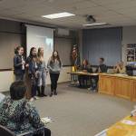 Sequim High School students (from left) Vita Olson, Erin Dwyer, Brianna Cowan and Ana Benitez talk last week with Sequim School Board directors about their experience at the HOSA (Future Health Professionals) state conference in March. Sequim Gazette photo by Michael Dashiell