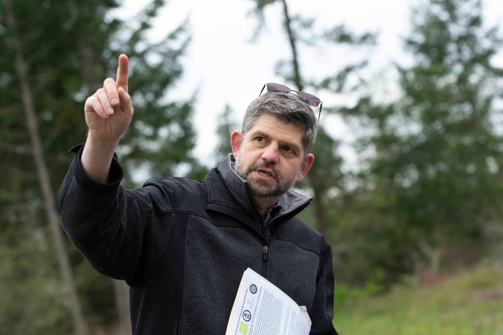 Clallam County Commissioner Mark Ozias talks about the proposed Dungeness Off-Channel Reservoir during a tour of the site of the project on April 22. Photo by Jesse Major/Peninsula Daily News