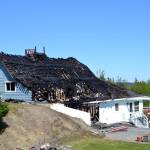 Fire officials with Clallam County District 3 believe a fire in this Gardiner home started in the attic from a wood stoves connection to the roof causing the southeast portion of the home to burn. Sequim Gazette photos by Matthew Nash