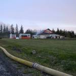A cause for the fire in this Gardiner home remains under investigation, says fire officials with Clallam County Fire District 3. When fire crews responded on April 26, the attic was fully involved in flames. Sequim Gazette photo by Matthew Nash