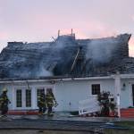 A cause for the fire in this Gardiner home remains under investigation, says fire officials with Clallam County Fire District 3. When fire crews responded on April 26, the attic was fully involved in flames. Sequim Gazette photo by Matthew Nash