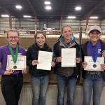Pictured, from left, are: Keri Tucker, with her third-place bronze medal in Working Rancher; Miranda Williams and Yana Hoesel, with District 4 scholarship awards, and Grace Niemeyer, with her gold medal in Jumping. Submitted photo