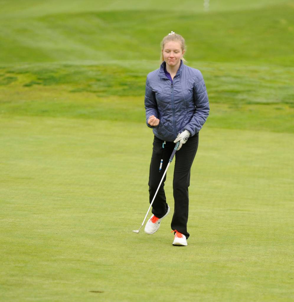 Sequims JoNell Hill gives a little fist pump after recording a 4 on the first hole at The Cedars at Dungeness on April 23. Hill placed sixth in the league match with a 52. Sequim Gazette photo by Michael Dashiell
