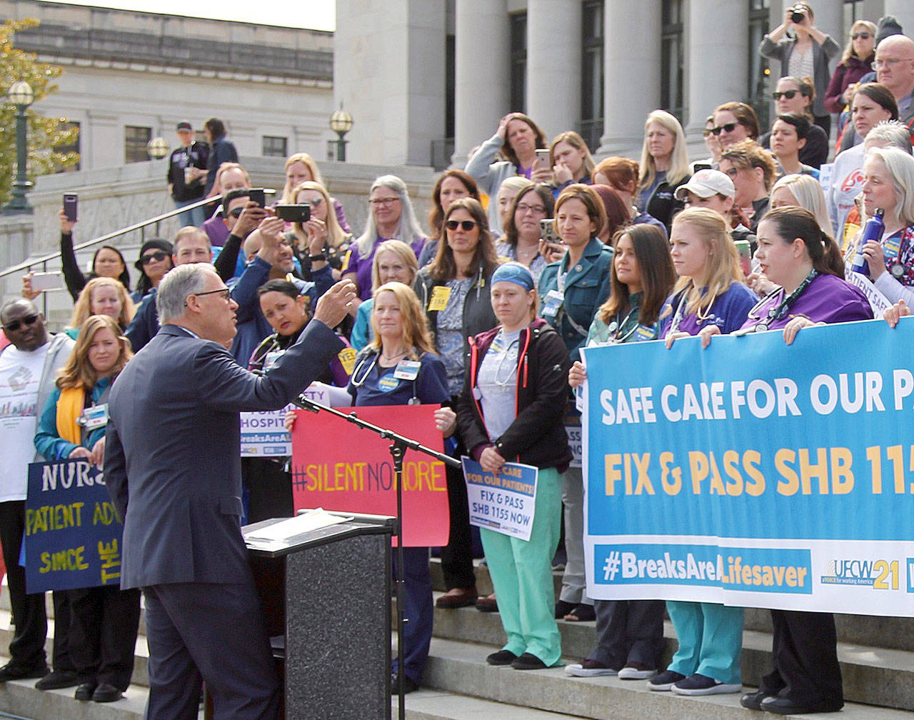 Gov. Jay Inslee speaks to protesting nurses on Wednesday, April 24. Inslee spoke on how important breaks are for both workers and patient care. Inslee indicated he would sign it into law if it passes both chambers. Photo by Emma Epperly/WNPA Olympia News Bureau
