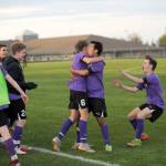 Teammates celebrate senior Chris Morgans free kick goal that put the Wolves up 3-0 early in the second half of a 7-0 win on April 26. Sequim Gazette photo by Matthew Nash