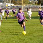 Mathys Tanche drives through North Mason players to help the Wolves win 7-0. Sequim Gazette photo by Matthew Nash
