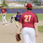 Sequims Joey Oliver advances to third base on a hit in the first inning of the Wolves 10-8 win over Kingston on April 26. Sequim Gazette photo by Michael Dashiell