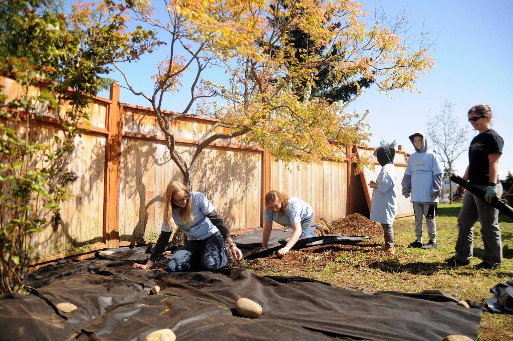 Helping beautify a home near downtown Sequim  one of several 2019 Beautiful Day projects throughout Sequim on April 27  are, from left, Cassidy Crecelius, Krista Baker, Ashton Shores, Gabe Wakefield and Brittany Van Ness. Sequim Gazette photo by Michael Dashiell