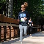 Marisa Zahn of Bremerton takes top honors in the female division of Saturdays Railroad Bridge 10k, placing fourth overall in 42:20. Laura Gould of Sequim was second (44:05). Sequim Gazette photo by Michael Dashiell