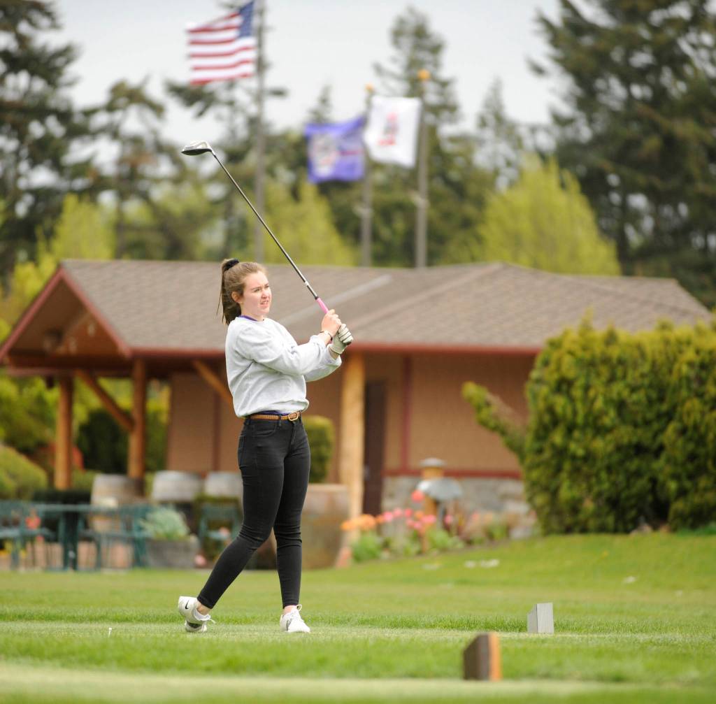 Sequims Brittany Gale tees off from the first hole at The Cedars at Dungeness on April 23. Gale and teammate Yana Hoesel qualified for the West Central District tournament at the April 30 Olympic League tournament. Sequim Gazette file photo by Michael Dashiell