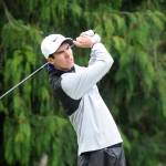 Blake Wiker, pictured here teeing off on the second hole at The Cedars at Dungeness golf course in Sequim on April 23, edged teammate Paul Jacobsen for medalist honors at the April 30 Olympic League tourney, also at The Cedars. Wiker, Jacobsen and Ben Sweet each earned state 2A tournament berths. Sequim Gazette file photo by Michael Dashiell