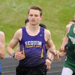 Sequim High senior Murray Bingham competes in the 1,600-meter race at an April 25 league meet in Port Angeles. Bingham and other Sequim Wolves look for district meet qualifying times and marks at the Olympic League championships set for May 9 and May 11 at North Kitsap High School in Poulsbo. Sequim Gazette file photo by Michael Dashiell