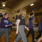 Future University of Washington students parade through the Sequim High School gym during SHS first Decision Day event. Sequim Gazette photo by Conor Dowley.