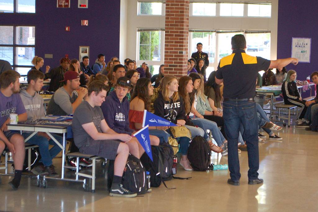 Sequim High School Principal Shawn Langston gets seniors ready for the schools inaugural Decision Day event. Sequim Gazette photo by Conor Dowley.