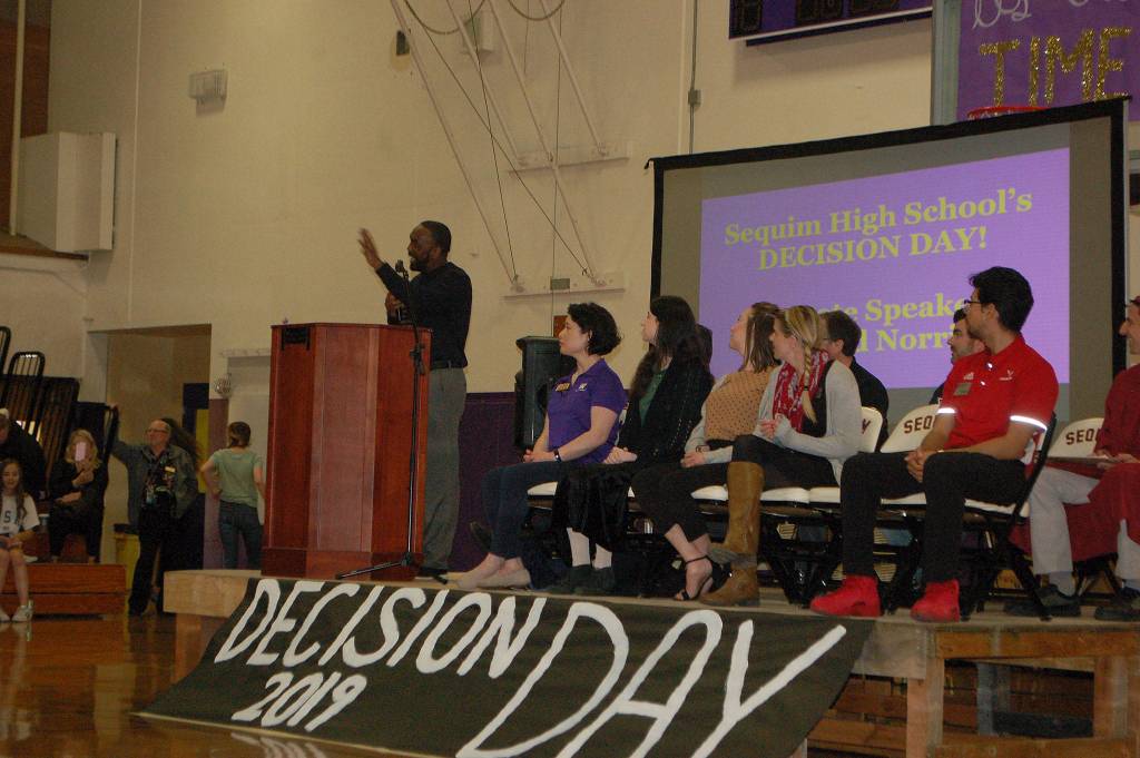 Keynote speaker Rashad Norris talks to students during Sequim High Schools Decision Day assembly.