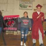 Sequim High School teacher Sean OMera walks with future Central Washington University student Nathalie Torres during SHS inaugural Decision Day assembly. Sequim Gazette photos by Conor Dowley.