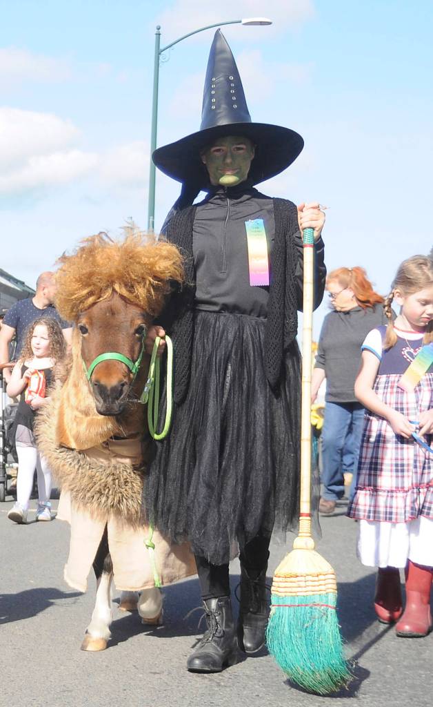 Olivia West, 12, of Sequim, along with her pony, Chrome, take part in Saturdays Kids Parade. Sequim Gazette photo by Michael Dashiell