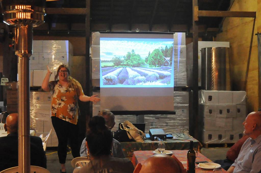 Anji Scalf, executive director of the Sequim-Dungeness Valley Chamber of Commerce, talks with Sequim and Port Angeles chamber members on May 6. Sequim Gazette photo by Michael Dashiell