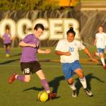 Sequims Reid Parker, left, and Ariano Taitague Chavez vie for possession in the first half of a May 7 West Central District playoff match-up. Sequim Gazette photo by Michael Dashiell