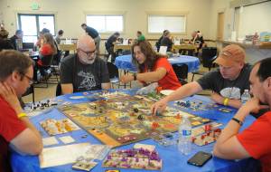 Gamers of all ages enjoying a board game session at Opttacon 2018. Sequim Gazette file photo by Michael Dashiell