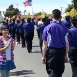 Adeline Fobian, 11, of Port Angeles, cheers for one of the many bands during the Irrigation Festivals Grand Parade. Sequim Gazette photo by Matthew Nash