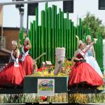 Sequim Irrigation Festival royalty  from left, princesses Brianna Cowan, Kjirstin Foresman and Shelby Wells and queen Emily Silva  wave to an adoring crowd at the 2019 Grand Parade on May 11.                                 Sequim Gazette photo by Michael Dashiell