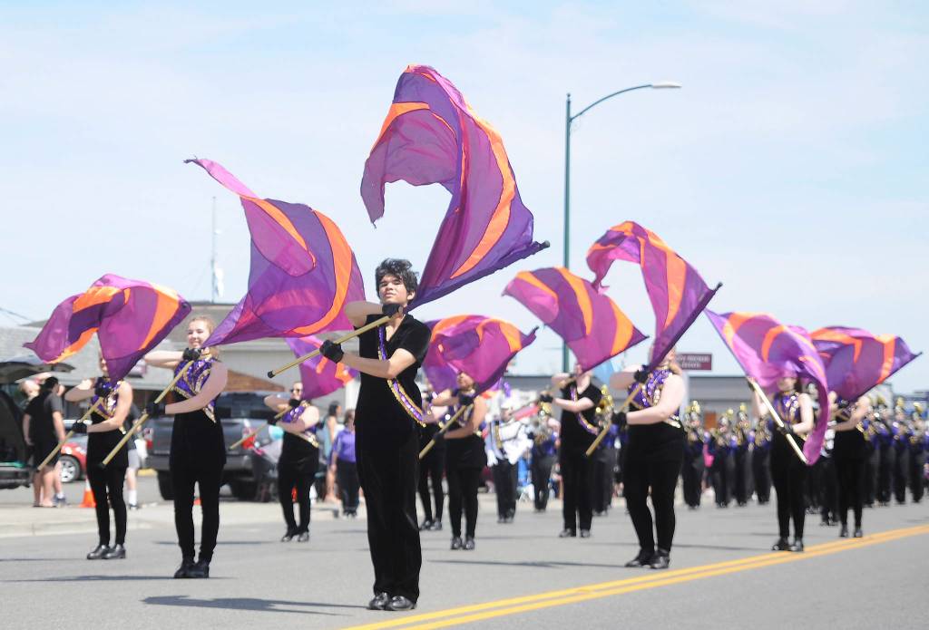 The Sumner Marching Band and Flag Team entertains the Sequim Irrigation Festival Grand Parade crowd on May 11. Sequim Gazette photo by Michael Dashiell