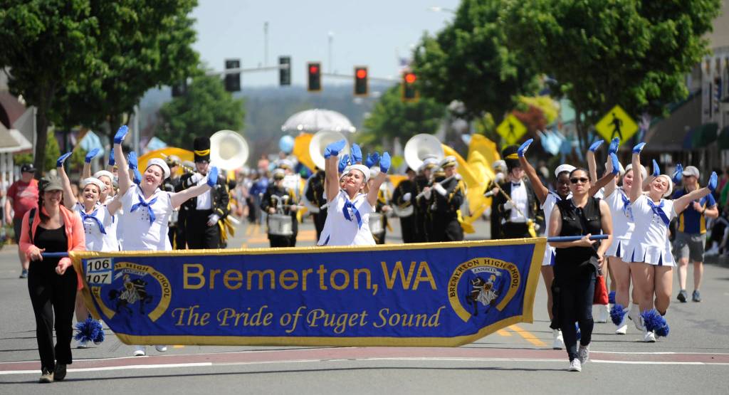 The U.S. Navy-themed Bremerton High School dance/drill team and band entertain the parade-going crowd in Sequim on May 11. Sequim Gazette photo by Michael Dashiell