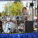 Michael Echternkamp  aka Sequims Rockin Realtor  plays for the Irrigation Festival Grande Parade crowd. Sequim Gazette photo by Michael Dashiell
