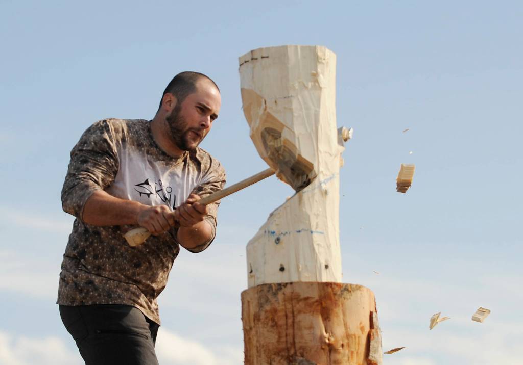Pat Mahoney gets to chopping in a Sequim Irrigation Festival Logging Show competition on May 11. Sequim Gazette photo by Michael Dashiell