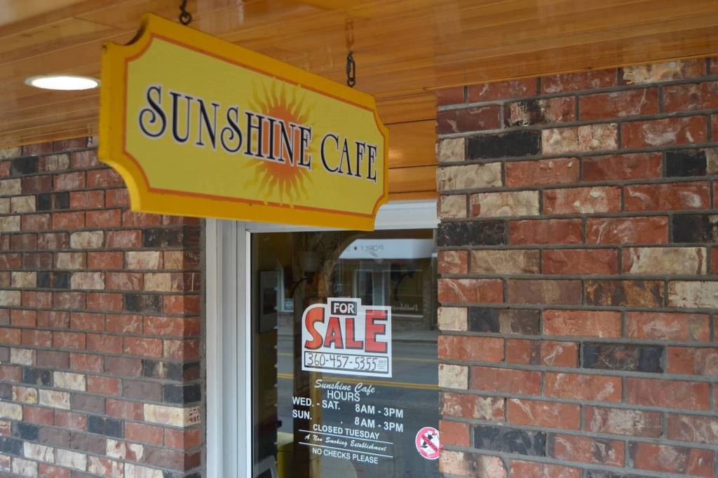 This month, Dianne and Allen Drake posted a For Sale sign in the front of the Sunshine Cafe after 19 years of ownership. The couple said they will likely continue to work after a sale while focusing on their health. Sequim Gazette photo by Matthew Nash