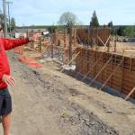 7 Cedars Casino chief executive officer Jerry Allen points on Saturday to the status of construction of the casinos new 100-room resort hotel next to the casino in Blyn. (Keith Thorpe/Peninsula Daily News)