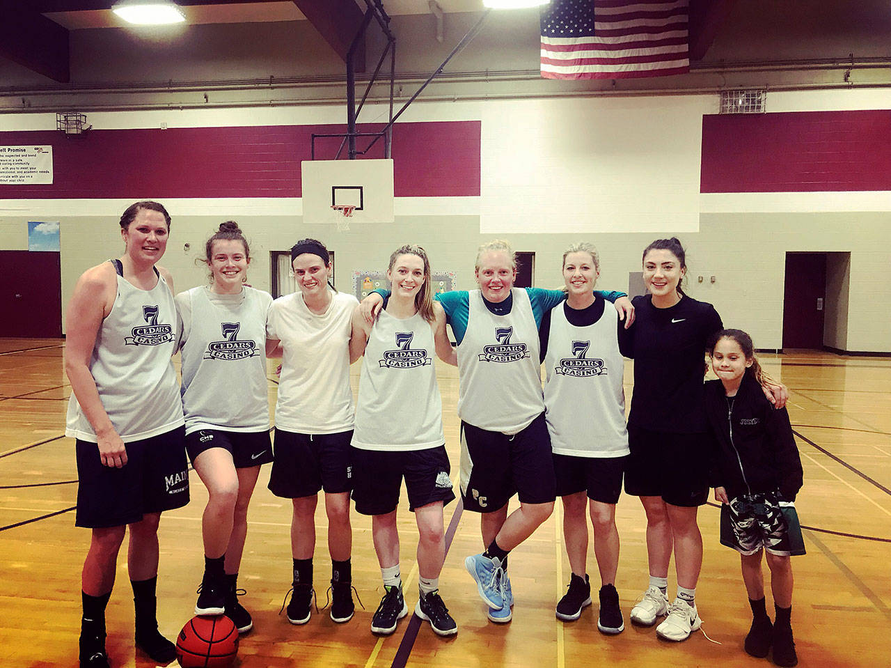 Members of the winning squad from 7 Cedars Casino celebrate a win in the Port Angeles Parks & Recreation womens basketball league on May 15. After splitting the first two of the best-of-three series, 7 Cedars Casino routed Elwha 80-58 in the decisive third game. Submitted photo
