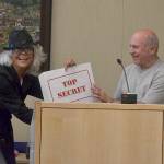 Sue Hagener, Sequim administrative services director, presents top secret results from The Peoples Project! to Sequim Mayor Dennis Smith on May 13. This year, 951 people mostly voted for new water fountains and automated garbage cans. Sequim Gazette photo by Matthew Nash