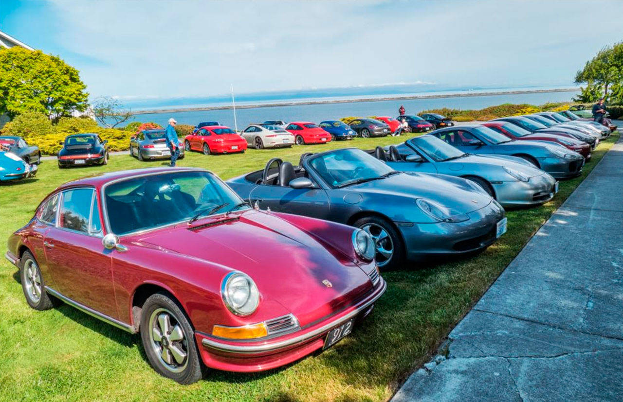 Sponsored by the Olympic Peninsula Region-Porsche Club of America and the 356 Club, and coinciding with a Sequim Cars & Coffee meeting, the Spring Tour-Car Collection event saw more than 80 vehicles on display at club member Dan Kalinskis property overlooking the Dungeness Spit on May 18. The fleet of vehicles featured a James Dean 550 Spyder replica along with several non Porsches, including Ford GTs, Mercedes, Ferraris, Corvettes and several other period show cars. For more about the club, see opr-pca.org/club-info. Photo by Bob Lampert