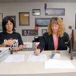 Susan Johnson of the Clallam County Auditors Office, left, reads names drawn by lot as Elections Manager Becky Pettigrew records the order that candidates will appear on the ballot during Fridays lot draw at the Clallam County Courthouse in Port Angeles. (Keith Thorpe/Peninsula Daily News)