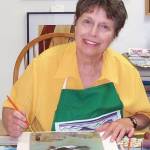 Sequim artist Sallie Radock, pictured here working in her studio, is a featured artist at the Harbor Art Gallery in Port Angeles in June. Submitted photo