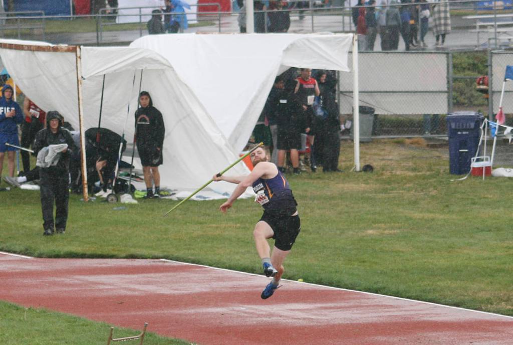 Sequims Riley Cowan competes in the javelin t the state 2A track and field championships on May 25. Cowan, a senior, placed second with a 176-6 throw, helping Sequim win the schools first track championship. Photo by Carol Lichten