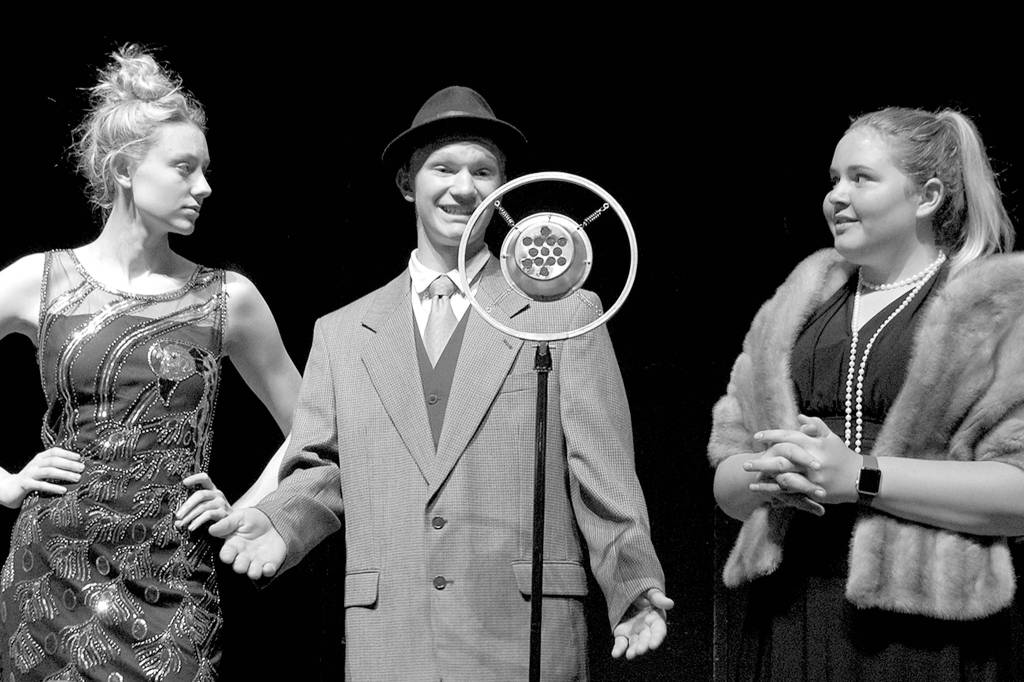 Lina Lamont and Don Lockwood (Mia Coffman and Dean Rynearson) respond to questions from Dora Bailey (Cadence Puhrmann), on right, during a rehearsal of the Olympic Peninsula Academys production of Singin In The Rain Jr. They open the night of May 31, and have two additional performances on June 1. Sequim Gazette photo by Conor Dowley