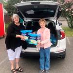 Soroptimist International of Sequim recently announced the formation of Dignity for Women, their newest program serving the Sequim Food Bank. Jeani Penn, left, and Becky Archer, present products to the food bank that for both women and children are difficult to obtain when seeking assistance, Soroptimist members say. Penn came to recognize this issue and requested the Sequim group begin the program. Photo courtesy of Soroptimist International of Sequim