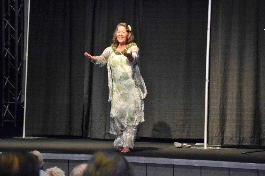 Elly Wilson shares a traditional Hawaiian dance during the fashion show portion of the Sequim-Dungeness Hospital Guilds Spring Luncheon. The event presented more than $27,000 to local agencies and raised more than $4,000 for future donations. Sequim Gazette photo by Matthew Nash