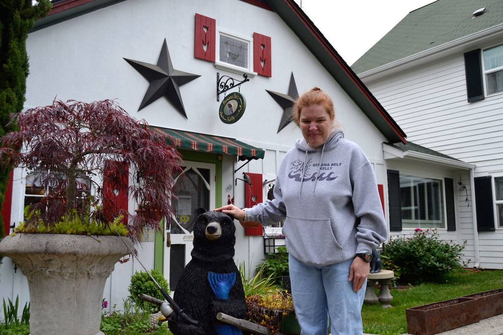 This year marks 10 years since Kelly Yarnes opened her home and decor shop Banana Belt Kelly on Riverside Road. Inside is a small sign commemorating her gold medal win at the 1988 International German American Special Olympics. Sequim Gazette photo by Matthew Nash