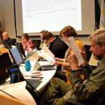Sequim city councilors read documents that were submitted just prior and at the May 28 meeting during a 15 minute recess. They later unanimously approved a 71-lot addition to Jennies Meadow but denied a variance to use the existing road as-is on Jennies Meadow Lane. Sequim Gazette photo by Matthew Nash