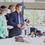 As students try out virtual reality devices, Sequim High School teacher Jorn Van de Weghe talks with Ann Wright-Mockler, Science & Engineering Education Consultant/Office of STEM Education for Pacific Northwest National Laboratory, at SHSs at the STEM Night event on May 28. Sequim Gazette photo by Conor Dowley