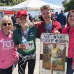 Sequims Mikey Cobb, third from left, celebrates a North Olympic Discovery Marathon win on June 2 with family members. They include, from left, parents Trisha and Michael Cobb (who also ran the full marathon) and sister Alison Cobb. Photo courtesy of Michael Cobb