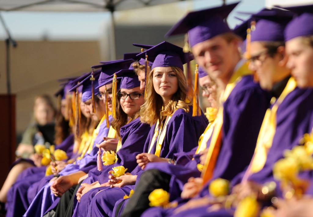 Sequim High graduate-to-be Madeline Patterson, center, joins about 180 of her classmates in graduation ceremonies on June 7. Sequim Gazette photo by Michael Dashiell